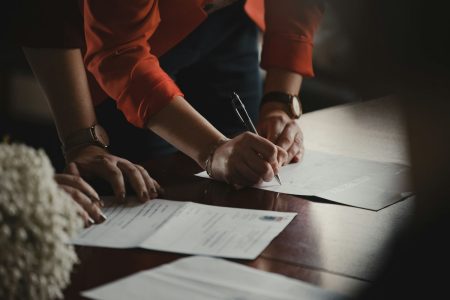 FBB-colorado-exit-planning-strategies-advisors People signing legal documents in an office